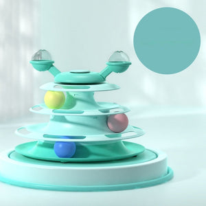 Mint green toy with colorful balls on a light gray background