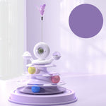 Multilevel cat toy with colorful spheres and a feather