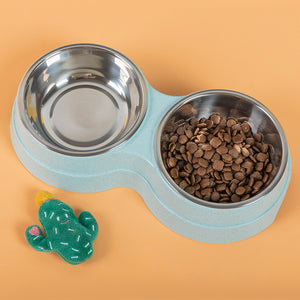 Pink dual feeder for pets