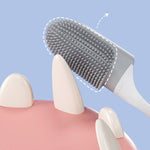 Yellow dog toothbrush finger wrap